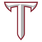 Stylized maroon and silver letter T logo with horn-like accents, likely a school or sports emblem